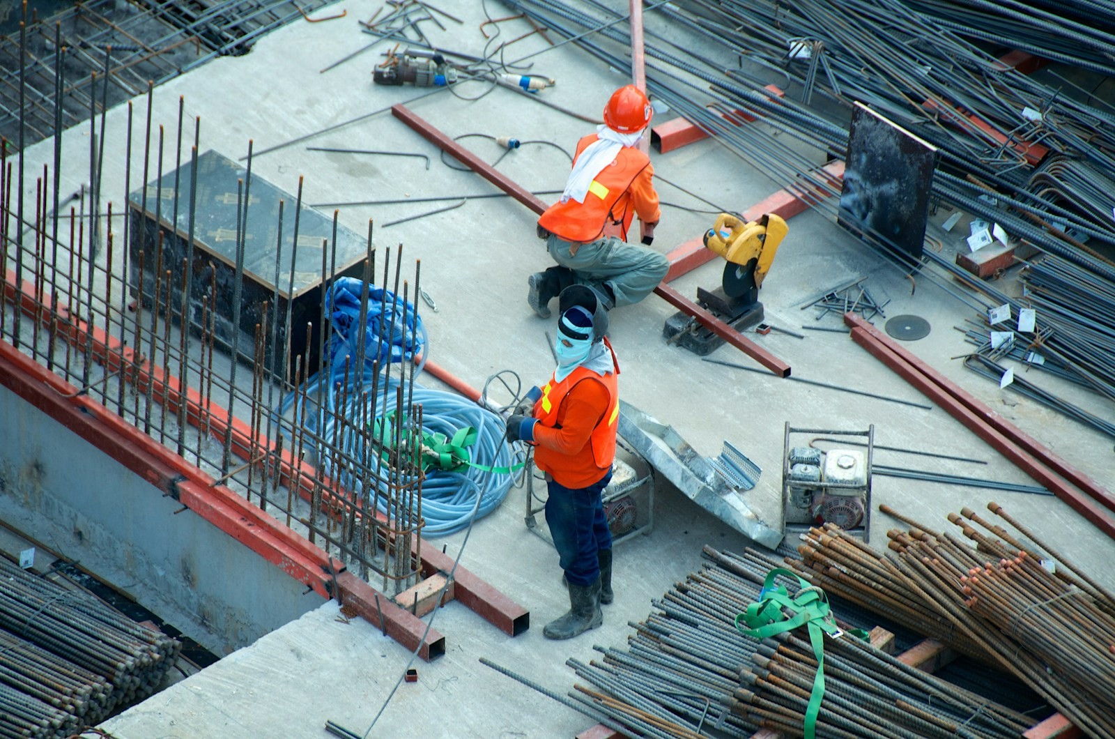 Certified welder fabricating structural steel moment connection